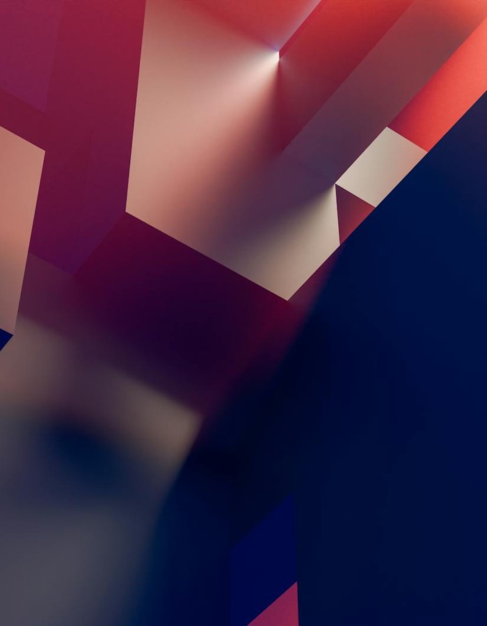 Dynamic abstract geometric shapes with a gradient of dark blue and warm pink tones.